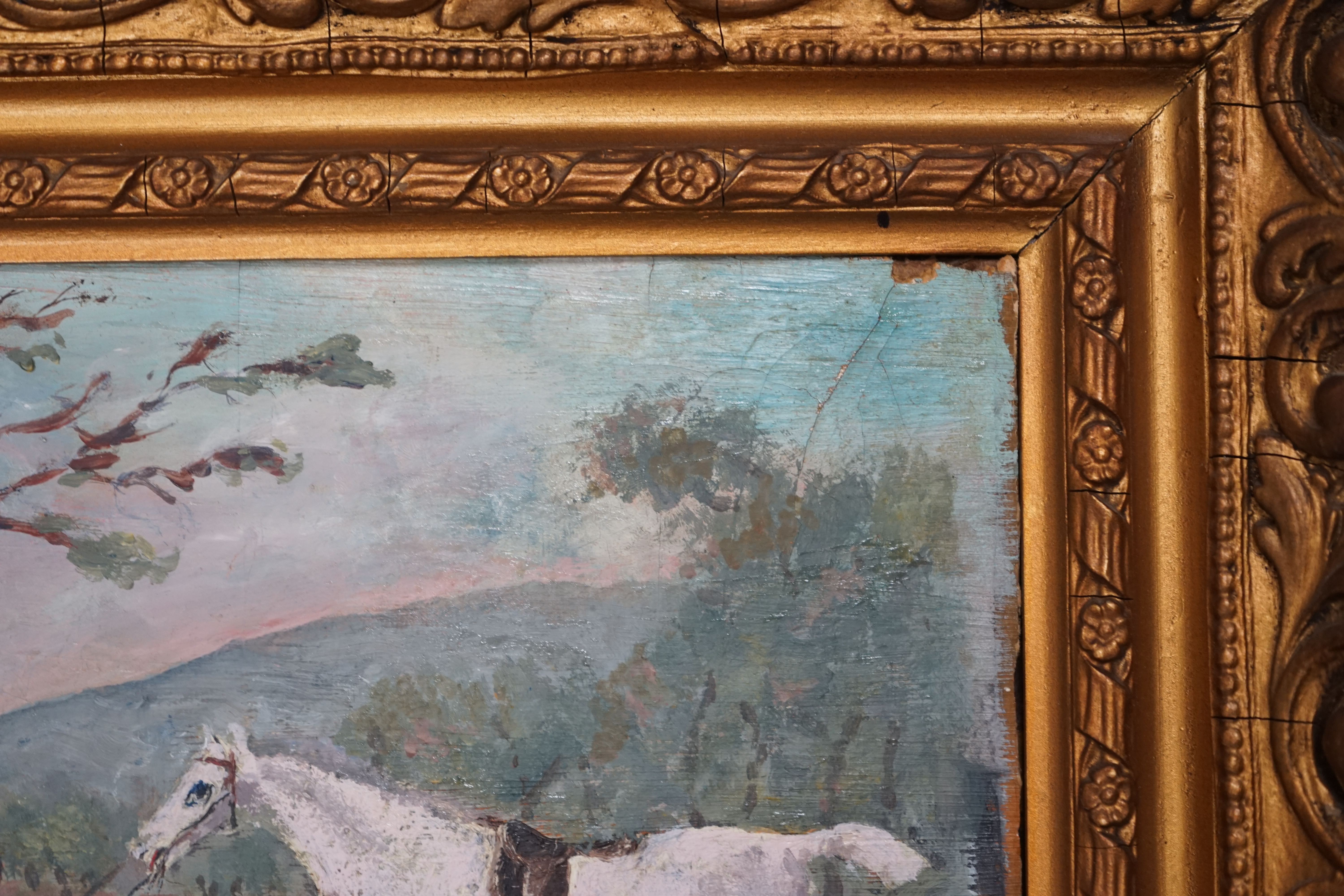 Late 19th century, naive oil on board, Huntsman with hounds before a landscape, 16 x 22cm, gilt framed. Condition - poor to fair